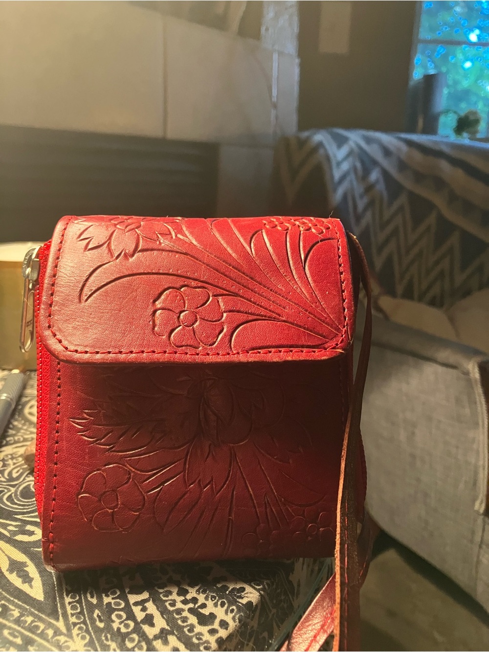 Embossed Red Leather Crossbody Bag with Floral Detail